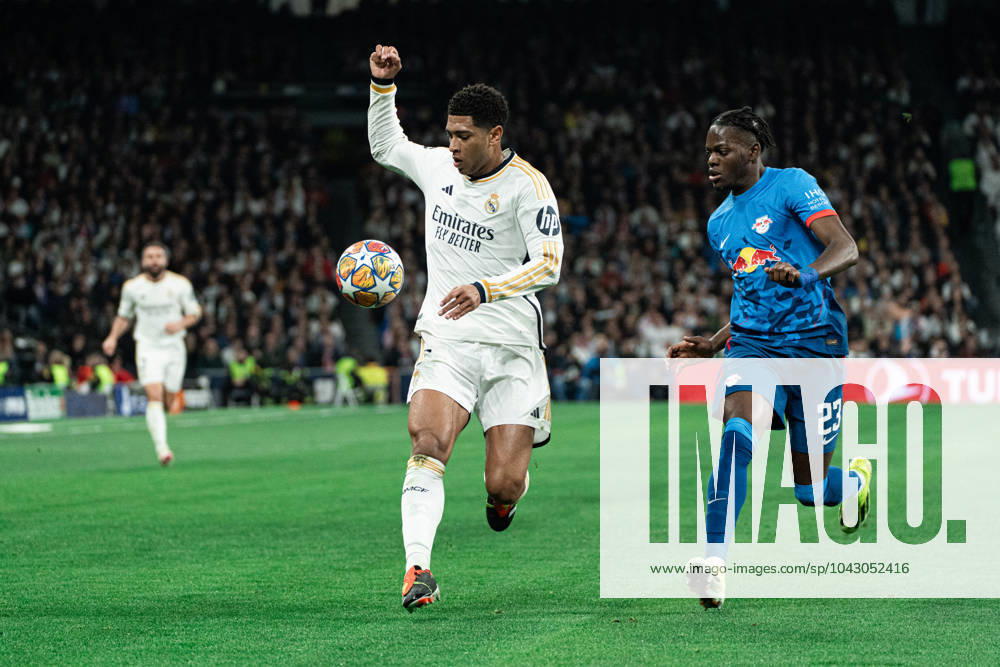 Real Madrid CF v RB Leipzig - Champions League MADRID, SPAIN, MARCH 6: Jude Bellingham of Real Madrid CF and Castello Lukeba of RB Leipzig during the 2st leg Champions League round of 16 match between Real Madrid CF and RB Leipzig at Estadio Santiago Bernabeu on March 06, 2024 in Madrid, Spain. Madrid Santiago Bernabeu Madrid Spain