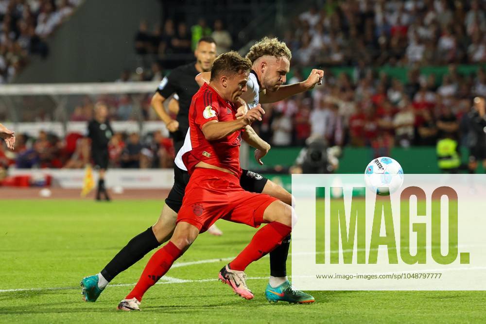 Im Zweikampf, Aktion, mit Joshua Kimmich 6 (FC Bayern Muenchen), Philipp Strompf 32 (SSV Ulm 1846), SSV Ulm 1846 vs. FC Bayern Muenchen, Fussball, DFB-Pokal, 1. Runde, 16.08.2024 DFB regulations prohibit any use of photographs as image sequences and or quasi-video Ulm Baden-Wuerttemberg Deutschland