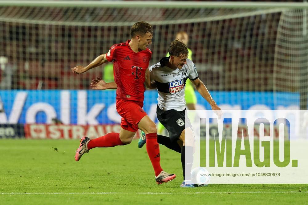 Im Zweikampf, Aktion, mit Joshua Kimmich 6 (FC Bayern Muenchen), Maurice Krattenmacher 30 (SSV Ulm 1846), SSV Ulm 1846 vs. FC Bayern Muenchen, Fussball, DFB-Pokal, 1. Runde, 16.08.2024 DFB regulations prohibit any use of photographs as image sequences and or quasi-video Ulm Baden-Wuerttemberg Deutschland