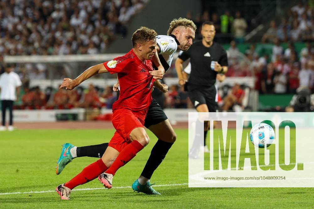 Im Zweikampf, Aktion, mit Joshua Kimmich 6 (FC Bayern Muenchen), Philipp Strompf 32 (SSV Ulm 1846), SSV Ulm 1846 vs. FC Bayern Muenchen, Fussball, DFB-Pokal, 1. Runde, 16.08.2024 DFB regulations prohibit any use of photographs as image sequences and or quasi-video Ulm Baden-Wuerttemberg Deutschland