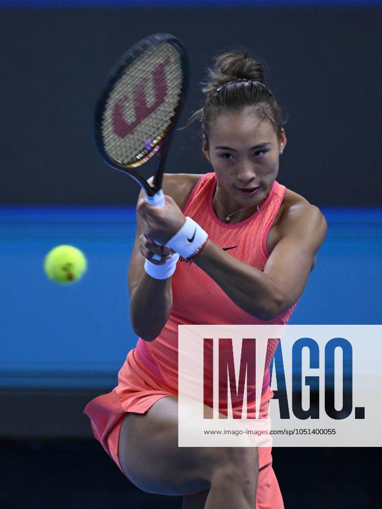 (241003) -- BEIJING, Oct. 3, 2024 -- Zheng Qinwen hits a return during the women s singles round of 16 match between Amanda Anisimova of the United States and Zheng Qinwen of China at the 2024 China Open tennis tournament in Beijing, China, Oct. 2, 2024. ) (SP)CHINA-BEIJING-TENNIS-CHINA OPEN-WOMEN S SINGLES(CN) ZhangxLong