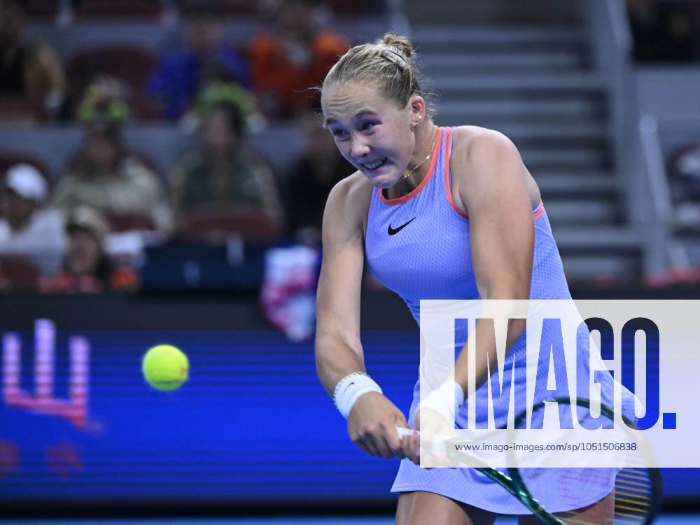 (241004) -- BEIJING, Oct. 4, 2024 -- Mirra Andreeva hits a return during the women s singles quarterfinal match between Zheng Qinwen of China and Mirra Andreeva of Russia at the 2024 China Open tennis tournament in Beijing, China, Oct. 4, 2024. ) (SP)CHINA-BEIJING-TENNIS-CHINA OPEN-WOMEN S SINGLES(CN) ZhangxLong