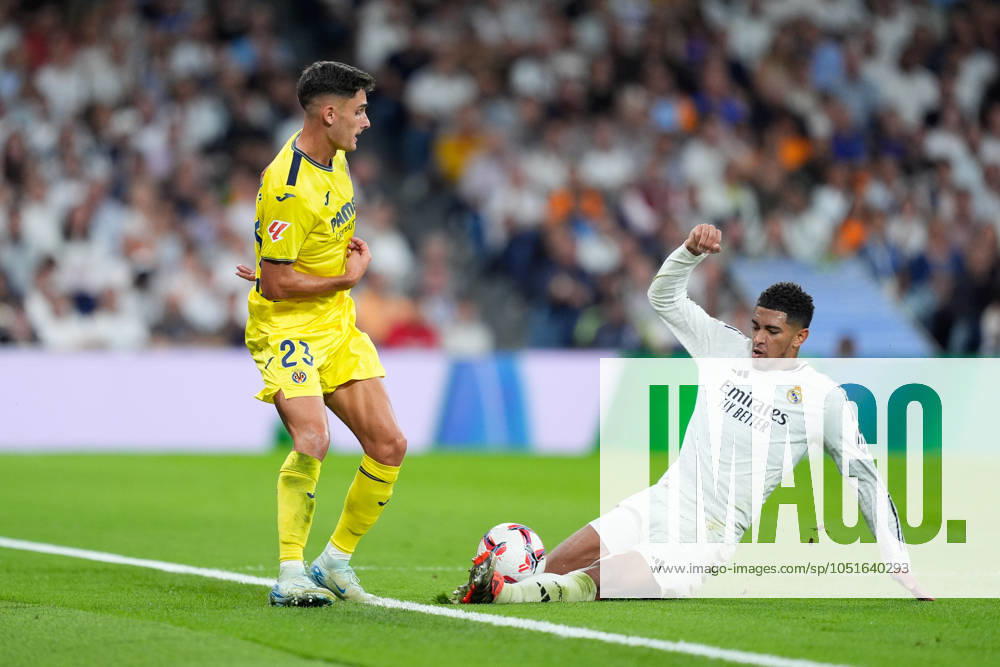 Sergi Cardona of Villarreal and Jude Bellingham of Real Madrid in action during the Spanish League, LaLiga EA Sports, football match played between Real Madrid and Villarreal CF at Santiago Bernabeu stadium on October 5, 2024, in Madrid, Spain. Madrid SPAIN - ZUMAa181 20241005_zaa_a181_224