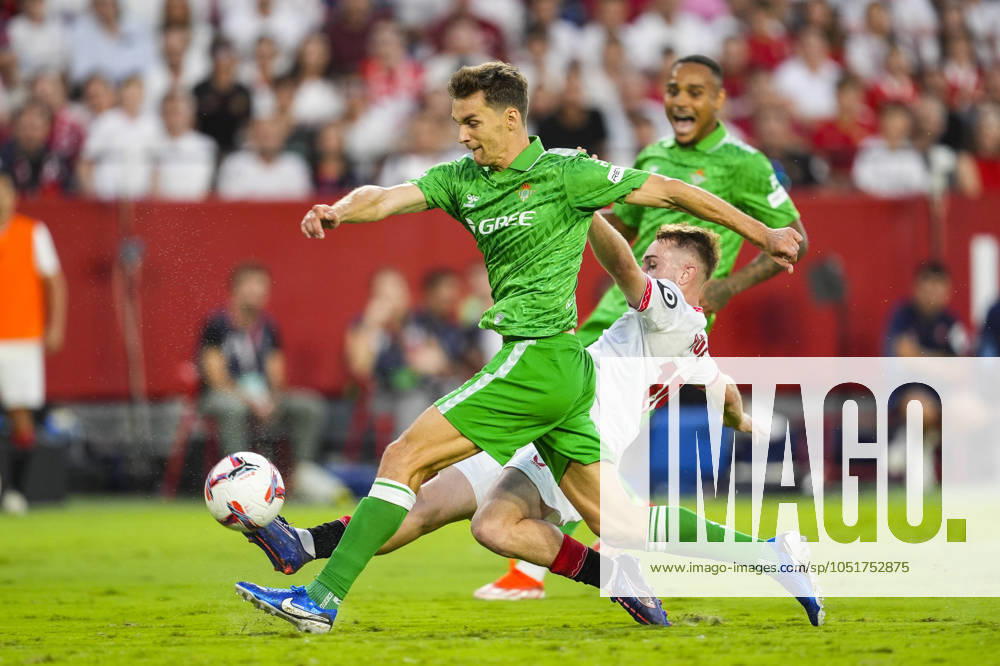 Diego Llorente of Real Betis and Peque Fernandez of Sevilla FC in action during the Spanish league, LaLiga EA Sports, football match played between Sevilla FC and Real Betis at Ramon Sanchez-Pizjuan stadium on October 6, 2024, in Sevilla, Spain. Sevilla SPAIN - ZUMAa181 20241006_zaa_a181_272