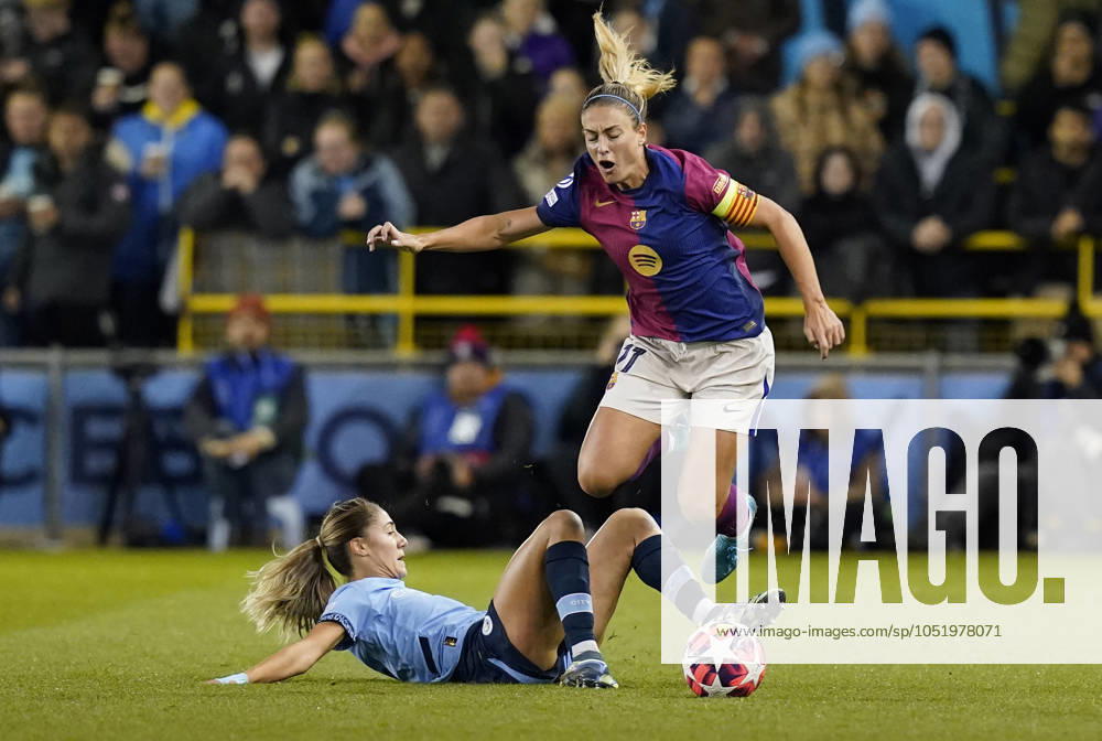 Manchester, England, 9th October 2024. Alexia Putellas of Barcelona (R) is challenged by Laia Aleixandri of Manchester City during the UEFA Womens Champions League match at the Academy Stadium, Manchester. Picture credit should read: Andrew Yates Sportimage . SPI-3368-0008
