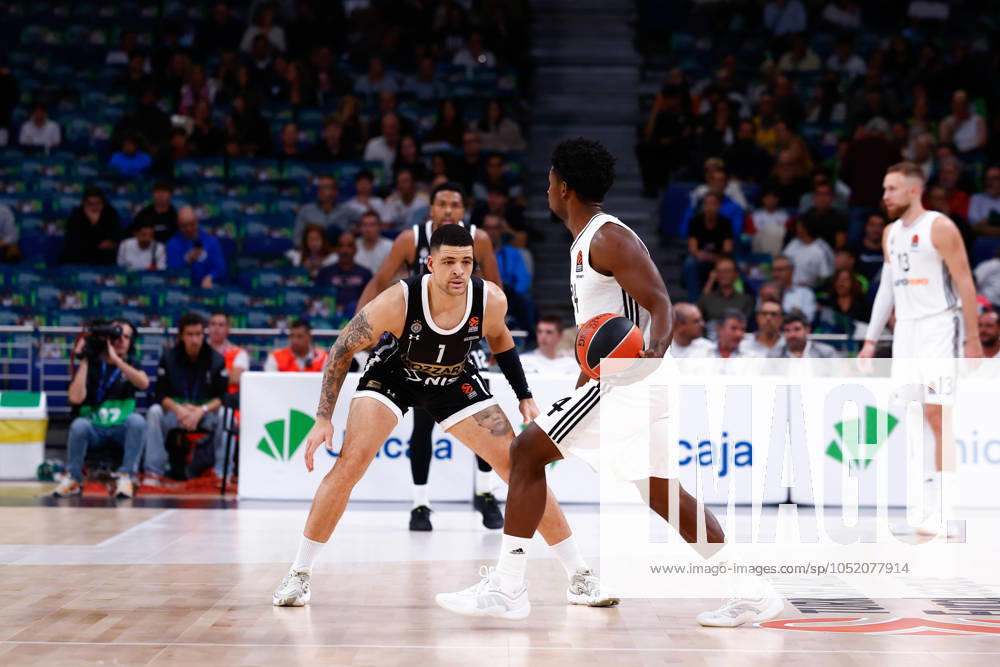 Andres Feliz of Real Madrid and Iffe Lundberg of Partizan Mozzart Bet Belgrade in action during the Turkish Airlines EuroLeague, basketball match played between Real Madrid and Partizan Mozzart Bet Belgrade at WiZink Center on October 10, 2024 in Madrid, Spain. Madrid SPAIN - ZUMAa181 20241010_zaa_a181_102
