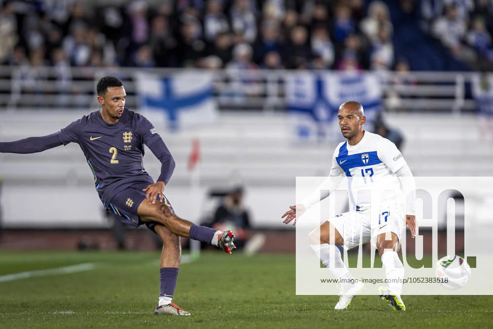 Trent Alexander-Arnold of England and Nikolai Alho of Finland during the UEFA Nations League Group B2 match between Finland and England at the Helsinki Olympic Stadium 13. October 2024 in Helsinki, Finland. (Mauri Forsblom Newspix24)