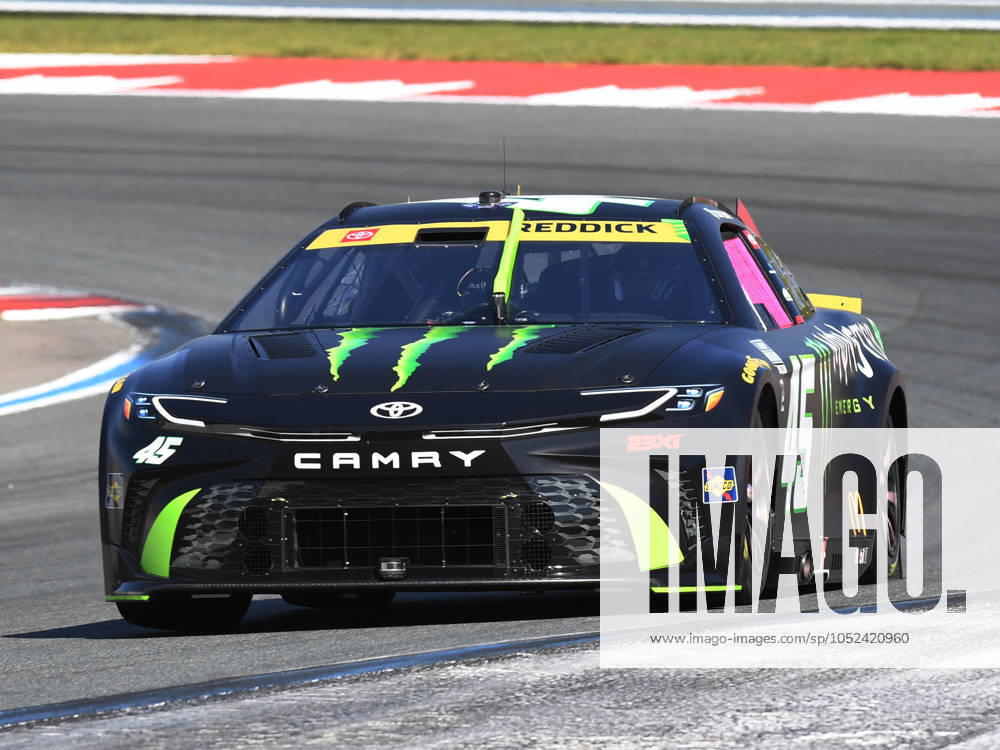 CHARLOTTE, NC - OCTOBER 13: Tyler Reddick ( 45 23XI Racing Monster Energy Toyota) races off Turn 5 during the running of the NASCAR, Motorsport, USA Cup Series Bank of America ROVAL 400 on October 13, 2024, at Charlotte Motor Speedway in Concord, NC. (Photo by Jeffrey Vest Icon Sportswire) AUTO: OCT 13 NASCAR Cup Series Bank of America ROVAL 400 Icon241013704