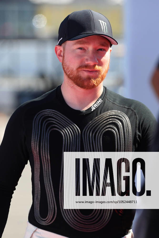 CHARLOTTE, NC - OCTOBER 13: Tyler Reddick ( 45 23XI Racing Monster Energy Toyota) walks to the pre-race stage prior to the running of the NASCAR, Motorsport, USA Cup Series Bank of America ROVAL 400 on October 13, 2024 at Charlotte Motor Speedway in Charlotte, NC. (Photo by Jeff Robinson Icon Sportswire) AUTO: OCT 13 NASCAR Cup Series Bank of America ROVAL 400 Icon2410132548400