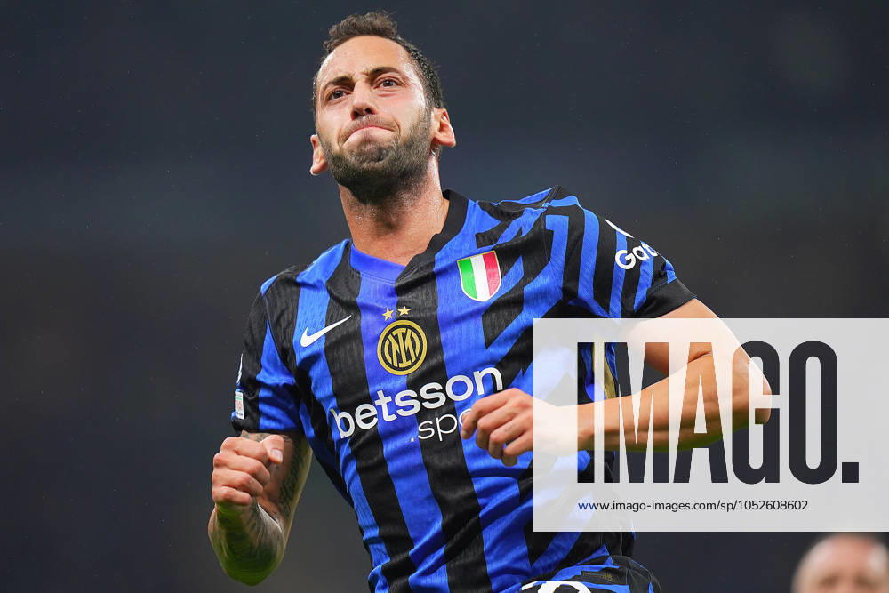 Inter Milan s Hakan Calhanoglu celebrates after scoring 1-0 during the Uefa Champions League soccer match between Inter and Fc Crvena at the San Siro Stadium in Milan, north Italy -Tuesday , October 1th , 2024. - Soccer .