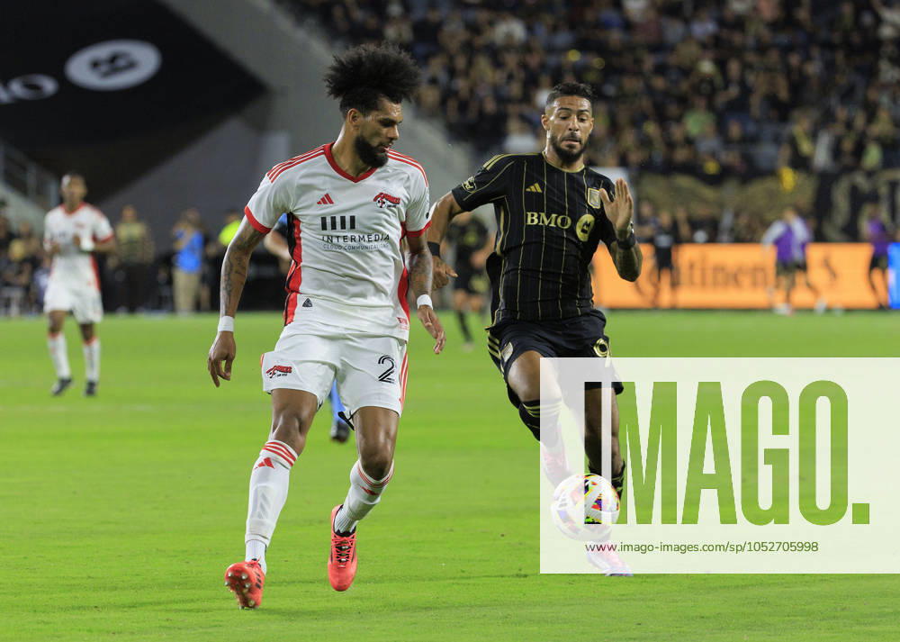 Denis Bouanga 99 of the Los Angeles Football Club is defended by Rodrigues 26 of the San Jose Earthquakes during their regular season MLS, Fussball Herren, USA match on Saturday October 19, 2024 at the BMO Stadium in Los Angeles, California. LAFC defeats Earthquakes, 3-1. JAVIER ROJAS PI Los Angeles USA - ZUMAp124 20241019_zaa_p124_053