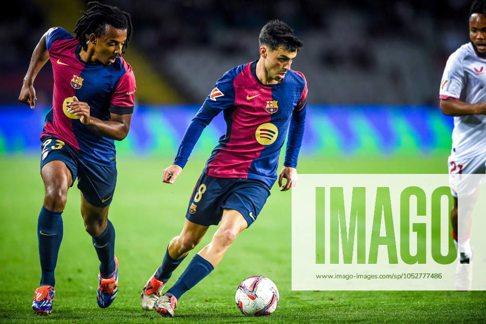 Jules KOUNDE of Barcelona and Pedro GONZALEZ LOPEZ (Pedri) of Barcelona during the LaLiga match between FC Barcelona, Barca and Sevilla FC at Estadi Olimpic Lluis Companys on October 20, 2024 in Barcelona, Spain. Barcelona Spain - ZUMAm308 20241020_zsp_m308_024