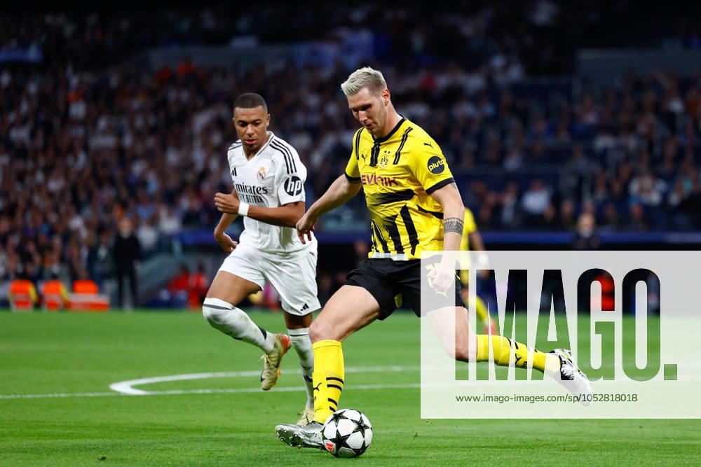 Niklas Sule of Borussia Dortmund in action during the UEFA Champions League 2024 25 League Phase MD3 match between Real Madrid CF and Borussia Dortmund at Estadio Santiago Bernabeu on October 22, 2024, in Madrid, Spain. Madrid SPAIN - ZUMAa181 20241022_zaa_a181_346
