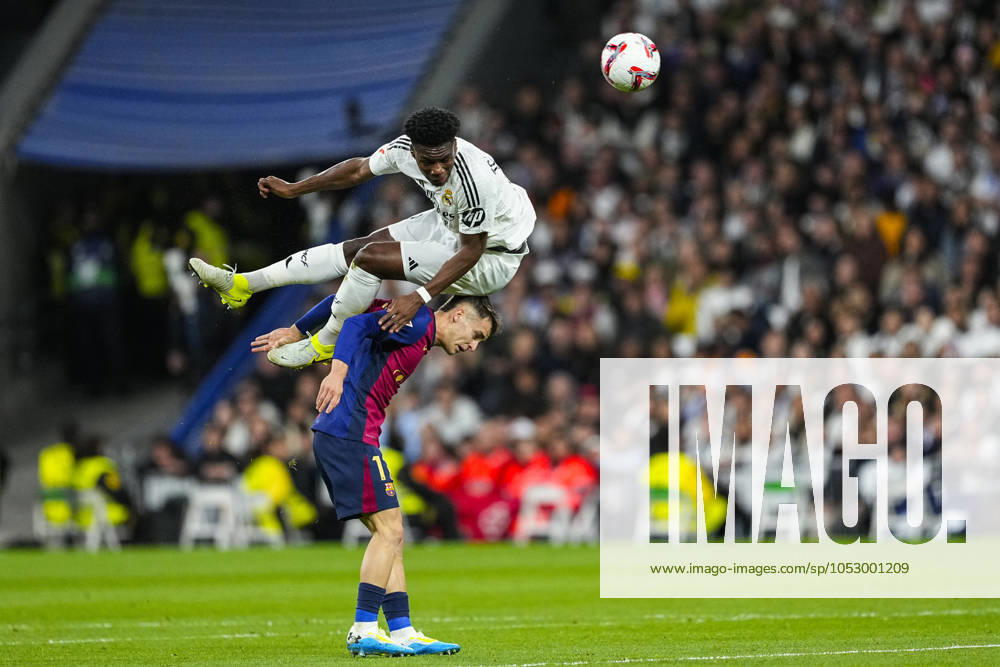 Aurelien Tchouameni of Real Madrid and Marc Casado of FC Barcelona, Barca in action during the Spanish league, La Liga EA Sports, football match played between Real Madrid and FC Barcelona at Santiago Bernabeu stadium on October 26, 2024, in Madrid, Spain. Madrid SPAIN - ZUMAa181 20241026_zaa_a181_220