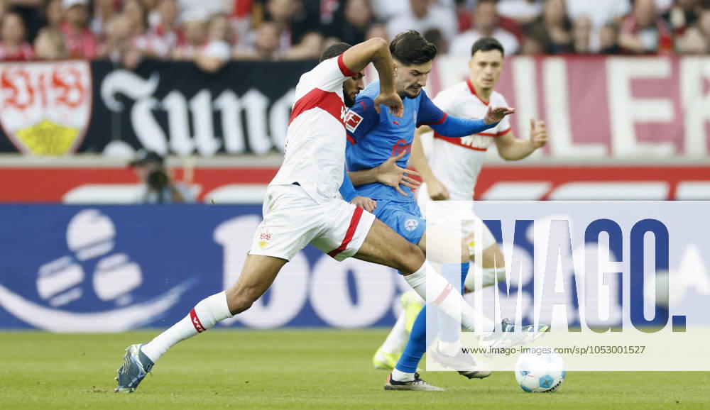 Im Bild: v.l. Josha Vagnoman (VFB Stuttgart, 4) und Armin Gigovic (Holstein Kiel, 37) im Zweikampf, 26.10.2024, Fussball, Bundesliga, VfB Stuttgart - Holstein Kiel, GER, Stuttgart, MHP Arena, DFL REGULATIONS PROHIBIT ANY USE OF PHOTOGRAPHS AS IMAGE SEQUENCES AND OR QUASI-VIDEO.