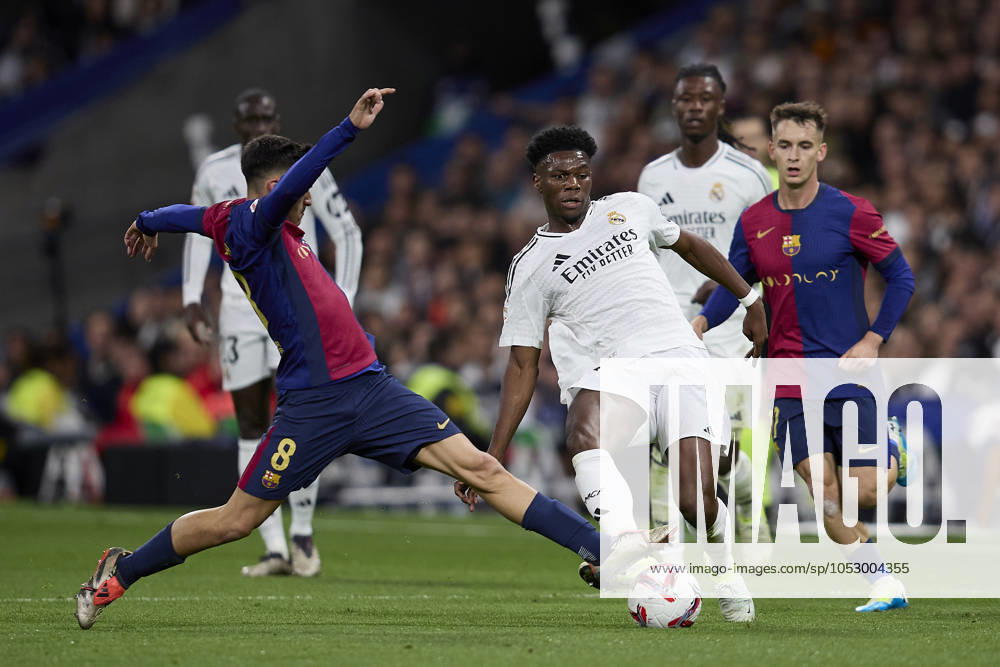 Aurelien Tchouameni of Real Madrid CF and Pedri of FC Barcelona, Barca during La Liga football match between Real Madrid CF v FC Barcelona at Santiago Bernabeu Stadium in Madrid, Spain, October 26, 2024 Madrid Spain - ZUMAa206 20241026_zsp_a206_069