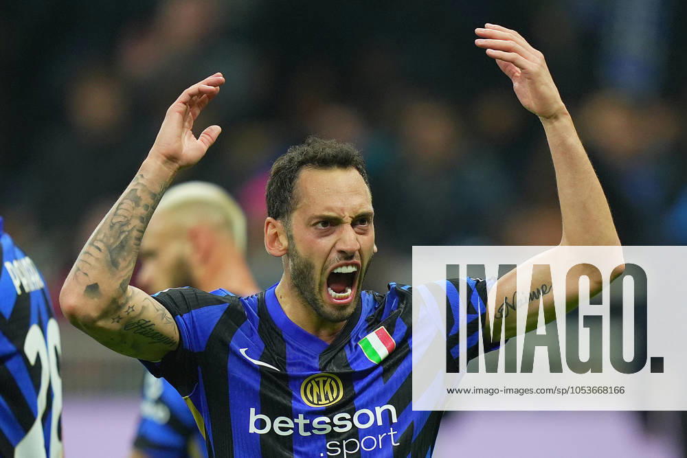 Inter Milan s Hakan Calhanoglu celebrates after scoring 1-1 during the Serie A soccer match between Inter and Napoli at San Siro Stadium in Milan , North Italy - Sunday , november 10 , 2024. - Soccer .