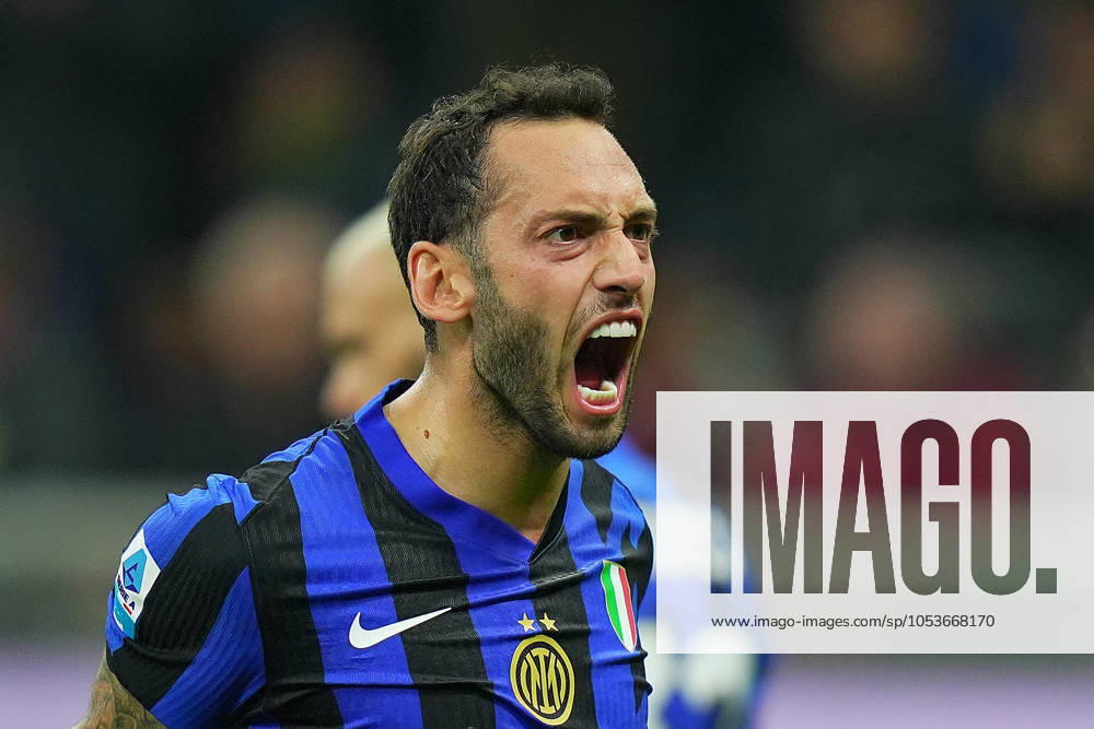 Inter Milan s Hakan Calhanoglu celebrates after scoring 1-1 during the Serie A soccer match between Inter and Napoli at San Siro Stadium in Milan , North Italy - Sunday , november 10 , 2024. - Soccer .