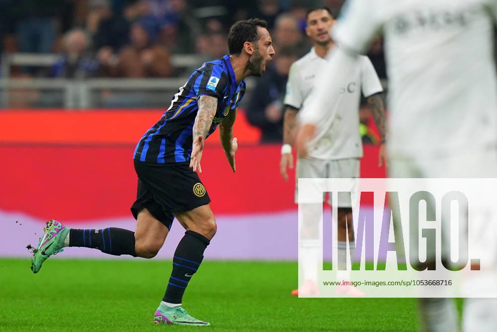 Inter Milan s Hakan Calhanoglu celebrates after scoring 1-1 during the Serie A soccer match between Inter and Napoli at San Siro Stadium in Milan , North Italy - Sunday , november 10 , 2024. - Soccer .