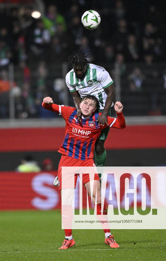 Kopfballduell Zweikampf Aktion Mikkel Kaufmann 1. FC Heidenheim 1846 FCH (29) gegen Stephan Ambrosius FC St. Gallen (05) 1. FC Heidenheim 1846 FCH vs FC St. Gallen 1879 19.12.2024 UEFA Conference League DFL REGULATIONS PROHIBIT ANY USE OF PHOTOGRAPHS AS IMAGE SEQUENCES AND OR QUASI-VIDEO 1. FC Heidenheim 1846 FCH vs FC St. Gallen 1879