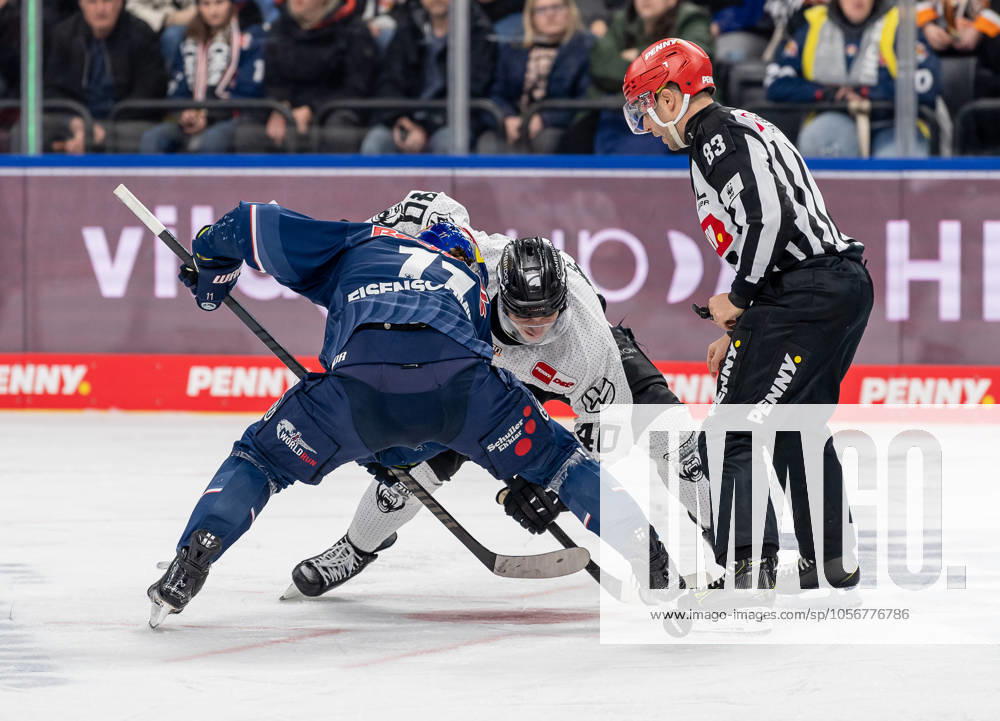Linesperson David Tschirner fuehrt ein Bully Faceoff aus zwischen Markus Eisenschmid (EHC Red Bull Muenchen, 11) und Julian Chrobot (Grizzlys Wolfsburg, 40). GER, EHC Red Bull Muenchen vs. Grizzlys Wolfsburg, Eishockey, DEL, 32. Spieltag, Saison 2024 2025, 30.12.2024. GER, EHC Red Bull Muenchen vs. Grizzlys Wolfsburg, Eishockey, DEL, 32. Spieltag, Saison 2024 2025, 30.12.2024. Muenchen