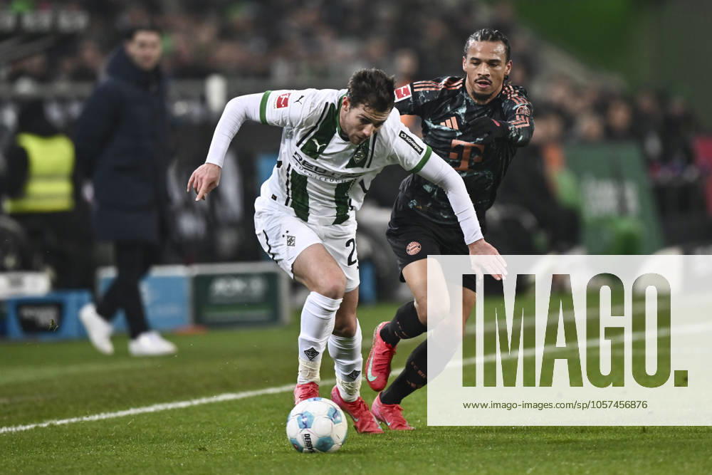 V. li. im Zweikampf Joe Scally (Moenchengladbach 29) Leroy Sane (Muenchen 10) 11.01.2025 Fussball Borussia Moenchengladbach vs FC Bayern Muenchen, Borussia-Park, Moenchengladbach, DFB DFL REGULATIONS PROHIBIT ANY USE OF PHOTOGRAPHS AS IMAGE SEQUENCES AND OR QUASI-VIDEO NRW Germany