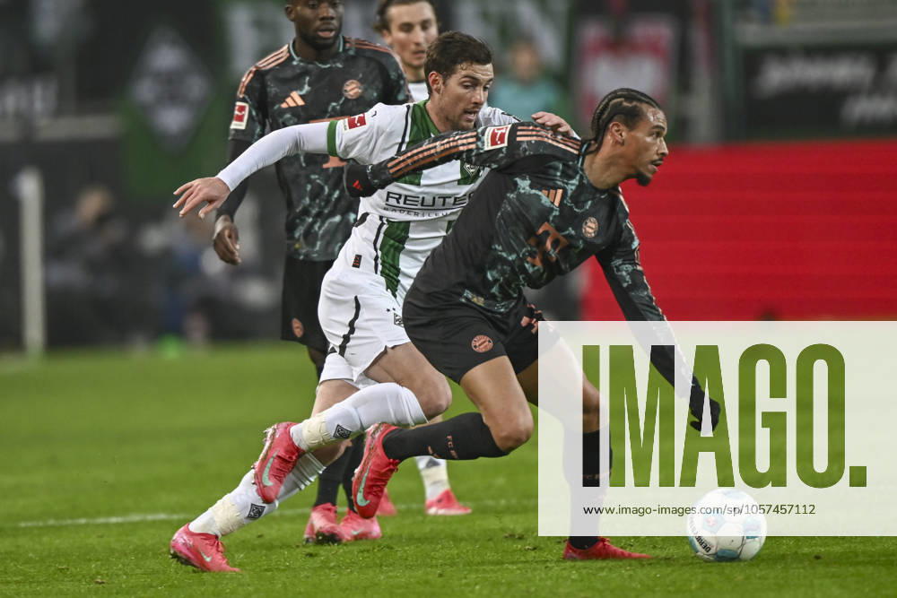 V. li. im Zweikampf Joe Scally (Moenchengladbach 29) Leroy Sane (Muenchen 10) 11.01.2025 Fussball Borussia Moenchengladbach vs FC Bayern Muenchen, Borussia-Park, Moenchengladbach, DFB DFL REGULATIONS PROHIBIT ANY USE OF PHOTOGRAPHS AS IMAGE SEQUENCES AND OR QUASI-VIDEO NRW Germany