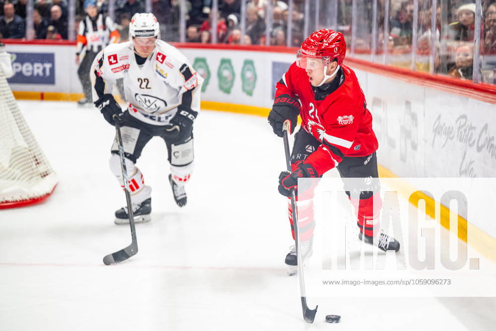 NL : Lausanne HC - HC Lugano 21.02.2025, Lausanne, Vaudoise Arena, NL: Lausanne HC - HC Lugano. Santeri Alatalo (22, HC Lugano) and Dominik Kahun (24, Lausanne HC) during the Swiss National League Ice hockey, Eishockey championship match between Lausanne HC and HC Lugano the Friday 21.02.2025 at the Vaudoise Arena in Lausanne, Switzerland. Lausanne Vaudoise Arena Vaud Switzerland