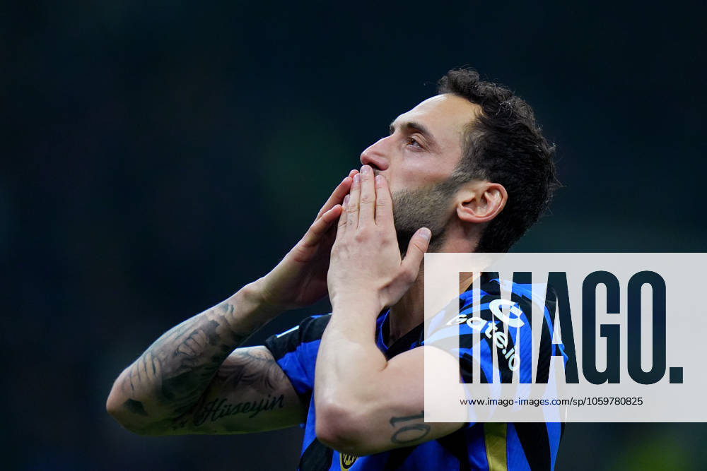 Inter Milan s Hakan Calhanoglu celebrates after scoring 2-0 during the Uefa Champions League soccer match between Inter and Feyenoord at the San Siro Stadium in Milan, north Italy - Tuesday , March 11 , 2025. - Soccer .