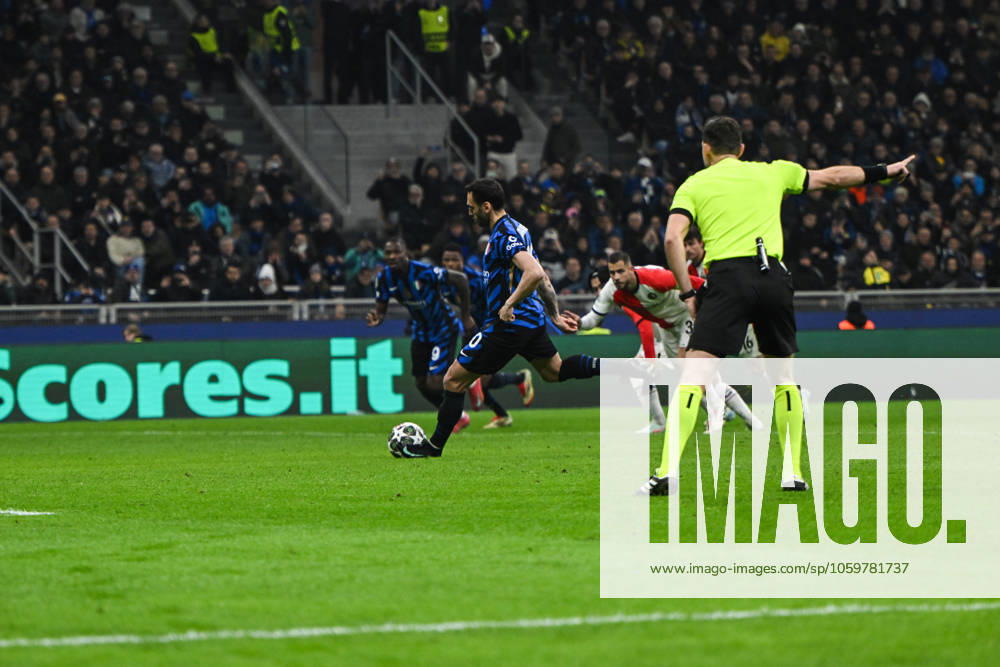 Hakan Calhanoglu of FC Internazionale scores a penalty during the UEFA Champions League round of 16 second leg match between Inter FC Internazionale and Feyenoord Rotterdam, on 10 of March 2025, at Giuseppe Meazza San Siro Siro stadium in Milan, Italy