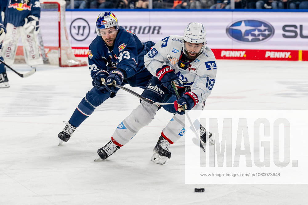 Kampf um den Puck Zweikampf zwischen Maximilian Kastner (EHC Red Bull Muenchen, 93) und Luke Esposito (Adler Mannheim, 19). GER, EHC Red Bull Muenchen vs. Adler Mannheim, Eishockey, DEL, Playoffs, Viertelfinale Spiel 2, Saison 2024 2025, 19.03.2025. GER, EHC Red Bull Muenchen vs. Adler Mannheim, Eishockey, DEL, Playoffs, Viertelfinale Spiel 2, Saison 2024 2025, 19.03.2025. Muenchen