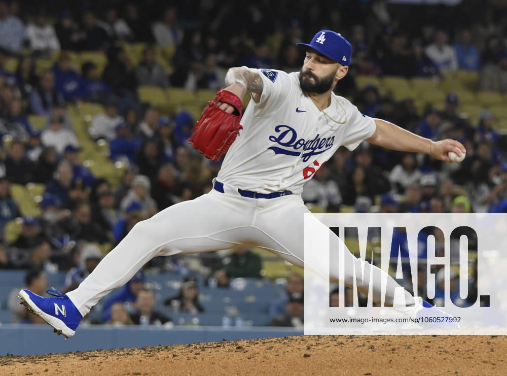 Los Angeles Dodgers closing pitcher Tanner Scott winds up to deliver in the ninth inning against the Atlanta Braves at Dodger Stadium in Los Angeles on Tuesday, April 1, 2025. The Dodgers defeated the Braves 3-1. LAP2025040133 JIMxRUYMEN