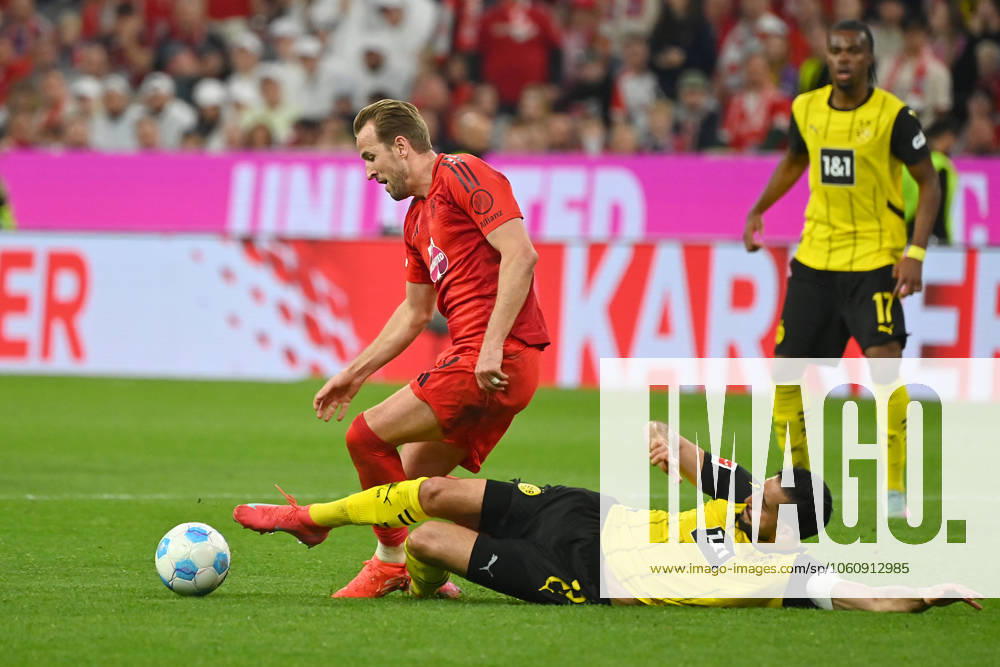 Harry KANE (Bayern Muenchen), Aktion,Zweikampf gegen Emre CAN (Borussia Dortmund). Fussball 1. Bundesliga Saison 2024 2025, 29.Spieltag, Spieltag29 FC Bayern Muenchen - Borussia Dortmund 2-2 am 12.04.2025 , A L L I A N Z A R E N A.