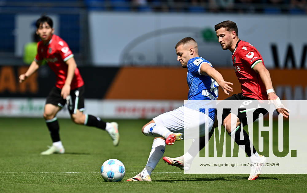 Fussball 2.Bundesliga, SV Darmstadt 98 - Hannover 96 v.l. Fabian Nürnberger Nuernberger (SV Darmstadt 98), Enzo Leopold (Hannover 96) (. Eine Lizenzierung dieses Bildes an und oder durch den SV Darmstadt 1898 e.V. sowie Tochterunternehmen ist nicht gestattet. No release of or sale to SV Darmstadt 1898 e.V.) Darmstadt