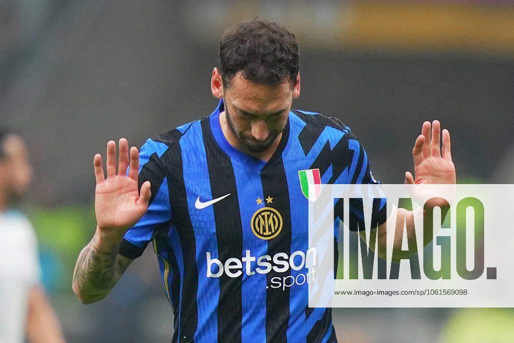 Inter Milan s Hakan Calhanoglu celebrates after scoring 2-0 during the Italy Cup Frecciarossa soccer match between Inter and Lazio at San Siro Stadium in Milan , North Italy - Tuesday , February 25 , 2025 . - Soccer .