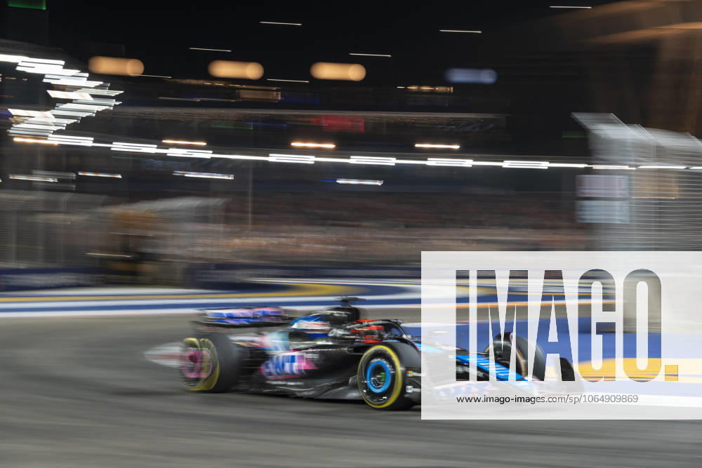 Formula 1 Singapore Grand Prix SINGAPORE, SINGAPORE - SEPTEMBER 22: Esteban Ocon from Alpine competes Formula 1 Singapore Grand Prix race at the Marina Bay Street Circuit in Singapore, on September 22, 2024. More than 269,000 fans turned out over race weekend according to the organisers. Singapore World. Editorial use only. Please get in touch for any other usage.