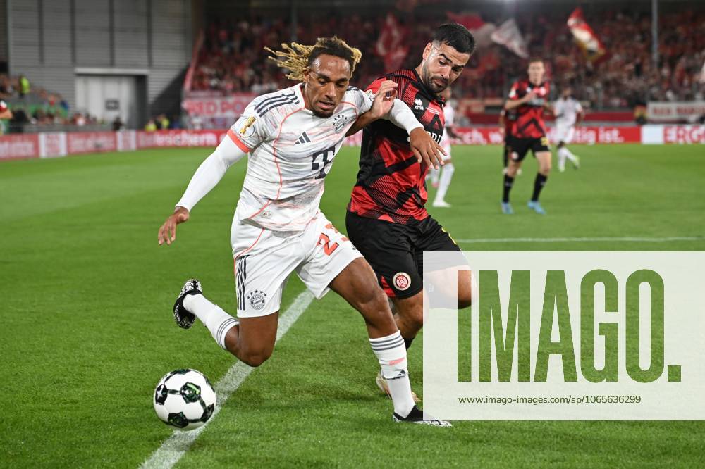 Harry KANE (Bayern Muenchen), Aktion,Zweikampf gegen Justin JANITZEK (WI) Fussball, DFB Pokal, 1.Hauptrunde, SV Wehen Wiesbaden (WI) - FC Bayern Muenchen (M) 2-3 am 27.08.2025 in de Brita-Arena in Wiesbaden Deutschland.