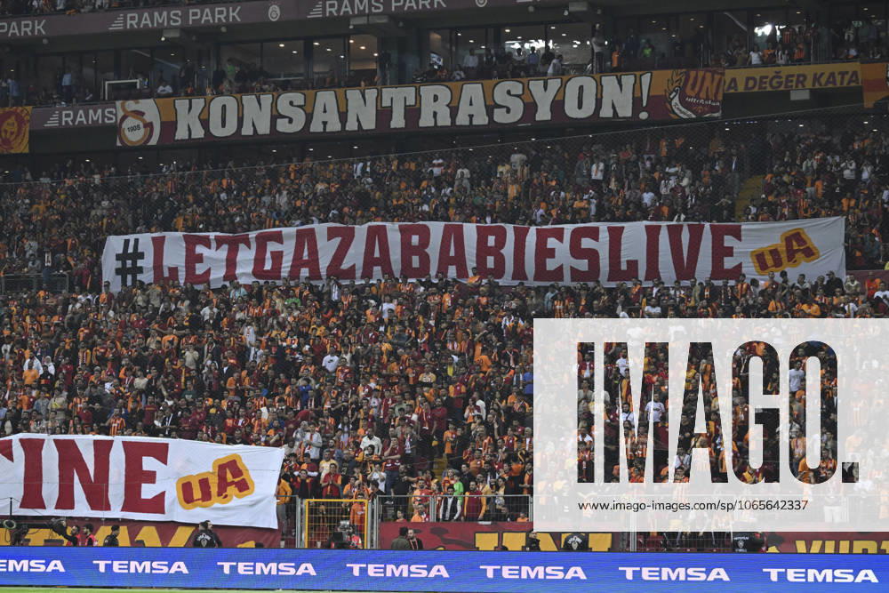 Galatasaray v Kasimpasa - Turkish Super Lig ISTANBUL, TURKIYE - NOVEMBER 3: Supporters hold a banner that reads Let Gaza babies live to protest against the Israeli attacks on Gaza during the Turkish Super Lig week 11 soccer match between Galatasaray and Kasimpasa in Istanbul, Turkiye on November 3, 2023. Istanbul Turkey. Editorial use only. Please get in touch for any other usage.
