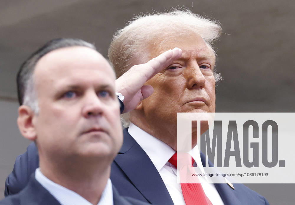 President Donald Trump salutes during the playing of the National Anthem before Jannik Sinner of Italy plays Carlos Alcaraz of Spain in the Men s Finals of the 2025 US Open Tennis Championship in Arthur Ashe Stadium at the USTA Billie Jean King National Tennis Center in Flushing Meadows, New York, on Sunday, September 7, 2025. NYP20250907117 COREYxSIPKIN