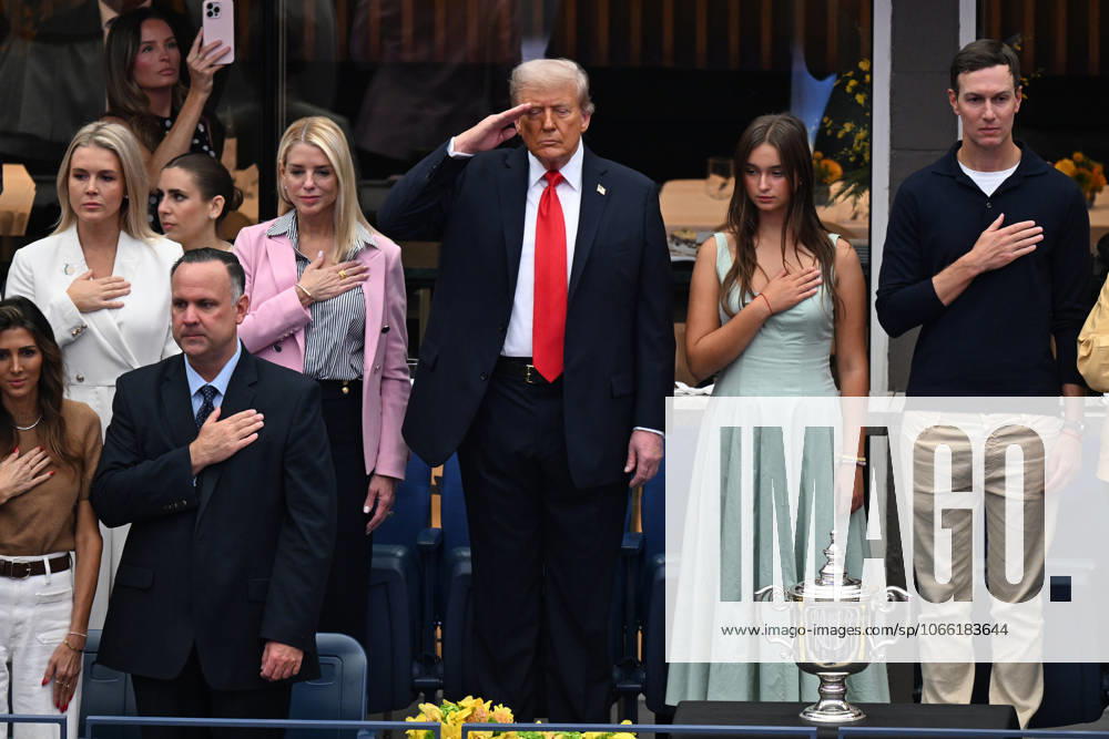 President Donald Trump salutes during the National Anthem before watching Jannik Sinner of Italy play Carlos Alcaraz of Spain in the Men s Finals of the 2025 US Open Tennis Championship in Arthur Ashe Stadium at the USTA Billie Jean King National Tennis Center in Flushing Meadows, New York, on Sunday, September 7, 2025. NYP20250907202 LARRYxMARANO