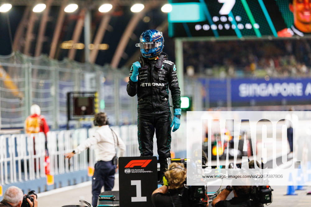 George Russell of Great Britain and the Mercedes-AMG PETRONAS Formula One Team celebrates after securing pole position ahead of the F1 Grand Prix of Singapore at the Marina Bay Street Circuit. Singapore Singapore - ZUMAs197 20251004_aaa_s197_344