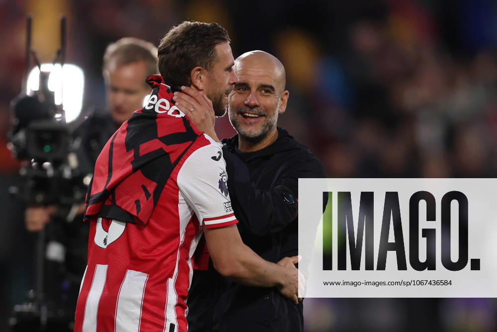 London, England, 5th October 2025. Jordan Henderson of Brentford and Josep Guardiola, Manager of Manchester City after the Brentford vs Manchester City Premier League match at Gtech Community Stadium, London. Picture credit should read: Paul Terry Sportimage . SPI_040_PT_Brentford_Man_City SPI-4202-0040