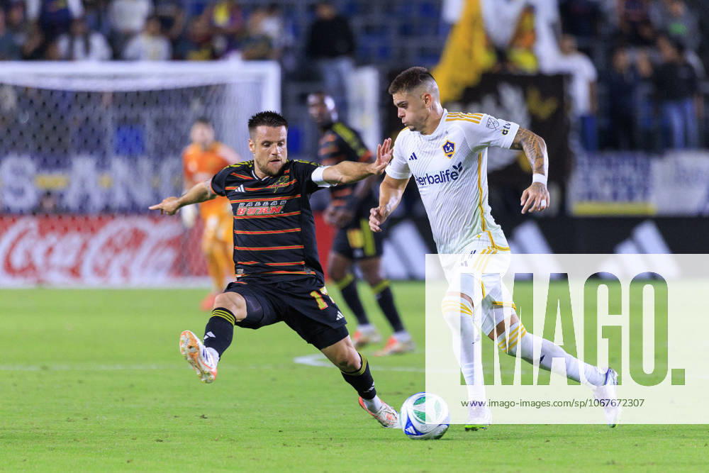 Gabriel Pec 11 of the LA Galaxy is defended by Ramiro 17 of the FC Dallas during their regular season MLS, Fussball Herren, USA match on Saturday October 11, 2025 at Dignity Health Sports Park Stadium in Carson, California. LA Galaxy defeats FC Dallas, 2-1. JAVIER ROJAS PI Los Angeles USA - ZUMAp124 20251011_zaa_p124_046