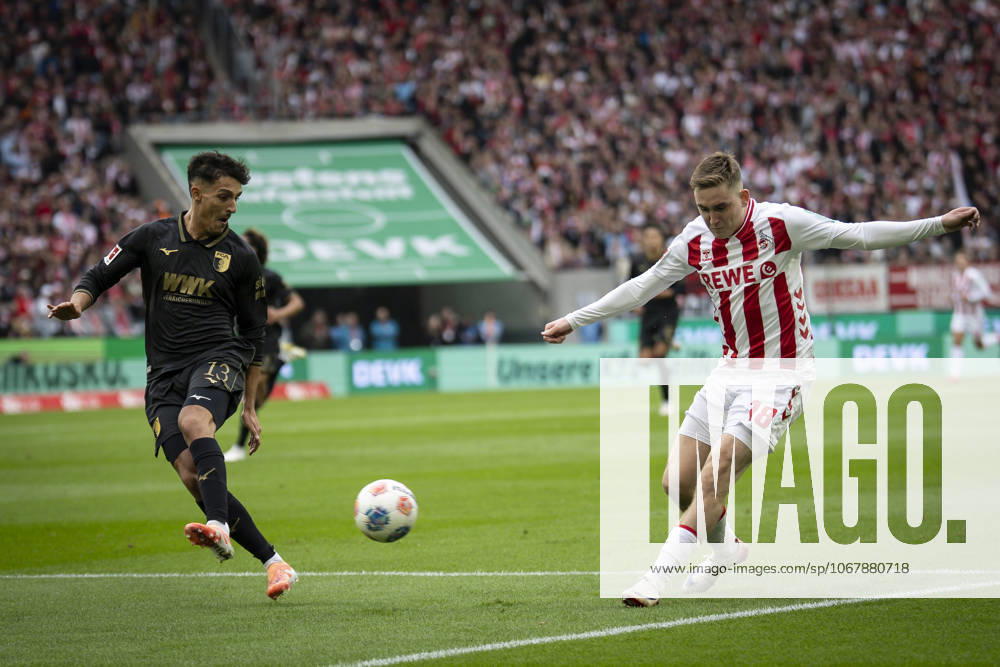 Isak Johannesson (1. FC Koeln, 18), Dimitris Giannoulis (FC Augsburg, 13) competing in the box during the Bundesliga match between 1. FC Koeln vs. FC Augsburg at the Rheinenergie-Stadion on matchday 7 of the 1. Bundesliga on October 18, 2025 in Koeln, Germany. DFL REGULATIONS PROHIBIT ANY USE OF PHOTOGRAPHS AS IMAGE SEQUENCES AND OR QUASI-VIDEO. Nordrhein-Westfalen Germany