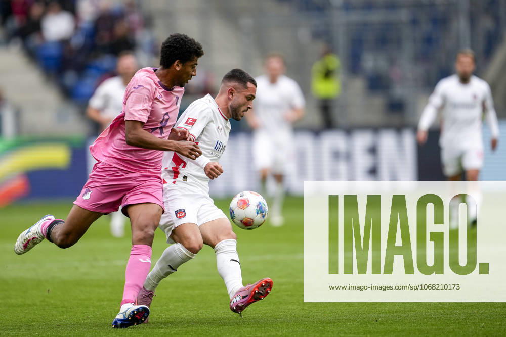 V.li.: Bernardo Fernandes da Silva Junior (Hoffenheim, 13), Arijon Ibrahimovic (FCH, 22), Zweikampf, Spielszene, Duell, duel, tackle, tackling, Dynamik, Action, Aktion, 25.10.2025, Sinsheim (Deutschland), Fussball, Bundesliga, TSG 1899 Hoffenheim - 1. FC Heidenheim, DFB DFL REGULATIONS PROHIBIT ANY USE OF PHOTOGRAPHS AS IMAGE SEQUENCES AND OR QUASI-VIDEO.