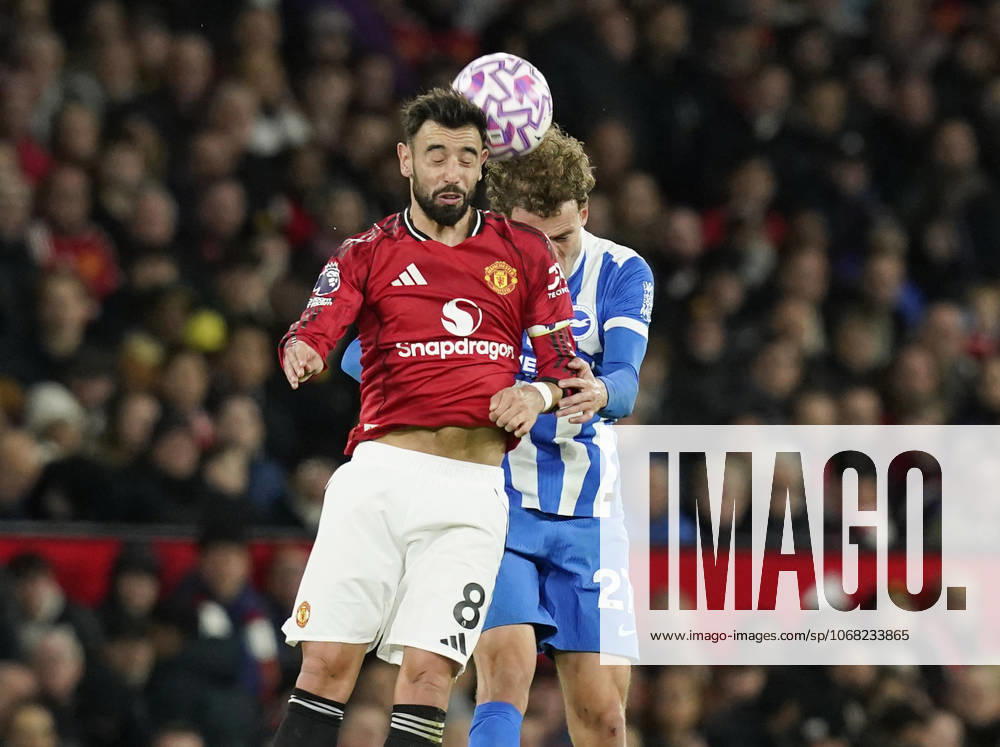 Manchester, England, 25th October 2025. Bruno Fernandes of Manchester United, ManU challenges Mats Wieffer of Brighton during the Manchester United vs Brighton and Hove Albion Premier League match at Old Trafford, Manchester. Picture credit should read: Andrew Yates Sportimage . SPI_067_AY_Man_Utd_Brighton SPI-4237-0066