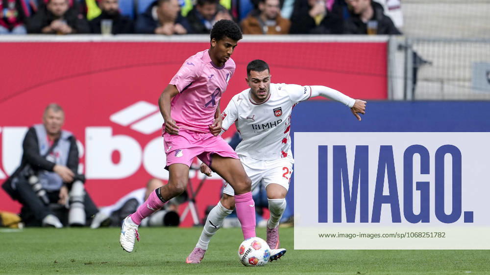 V.li.: Bernardo Fernandes da Silva Junior (Hoffenheim, 13), Arijon Ibrahimovic (FCH, 22), Zweikampf, Spielszene, Duell, duel, tackle, tackling, Dynamik, Action, Aktion, 25.10.2025, Sinsheim (Deutschland), Fussball, Bundesliga, TSG 1899 Hoffenheim - 1. FC Heidenheim, DFB DFL REGULATIONS PROHIBIT ANY USE OF PHOTOGRAPHS AS IMAGE SEQUENCES AND OR QUASI-VIDEO.