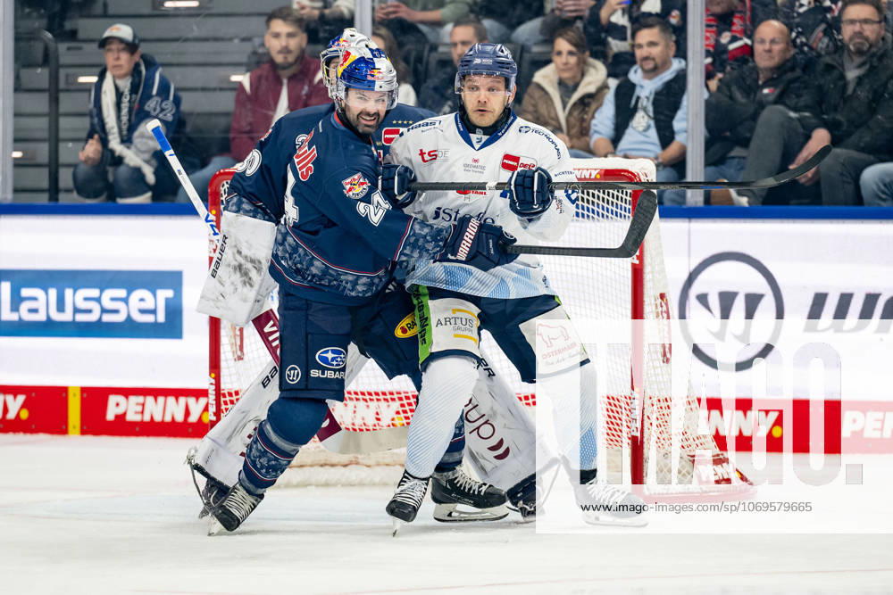 Ryan Murphy (EHC Red Bull Muenchen, 24) verteidigt gegen Tim Brunnhuber (Straubing Tigers, 19) vor dem Tor von Antoine Bibeau (Torwart, EHC Red Bull Muenchen, 30) GER, EHC Red Bull Muenchen vs. Straubing Tigers, Eishockey, DEL, 22. Spieltag, Saison 2025 2026, 25.11.2025. GER, EHC Red Bull Muenchen vs. Straubing Tigers, Eishockey, DEL, 22. Spieltag, Saison 2025 2026, 25.11.2025. Muenchen