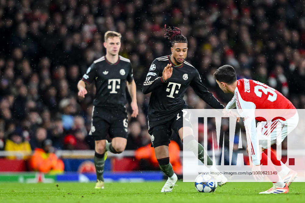 Joshua Kimmich (Bayern München), Michael Olise (Bayern München) und Martin Zubimendi (Arsenal FC) battle for the ball during the UEFA Champions League 2025 26 League Phase MD5 match between Arsenal FC and FC Bayern München at Arsenal Stadium on November 26, 2025 in London, United Kingdom. (Photo by Harry Langer DeFodi Images)