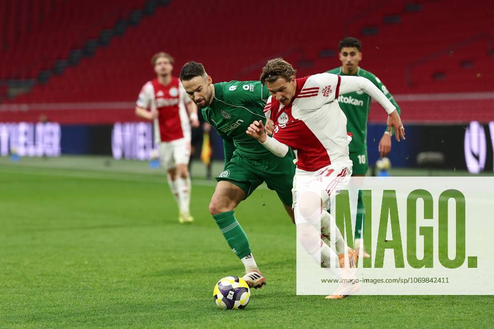 , JohanCruyff Arena , season 2025 2026 , Dutch Eredivisie Football , match between Ajax and FC Groningen (replay) , Picture shows , FC Groningen player Marco Rente, .Ajax player Mika Godts Ajax - Groningen (replay) x32313332x